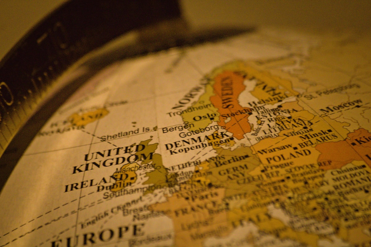 World map with monthly destination pins